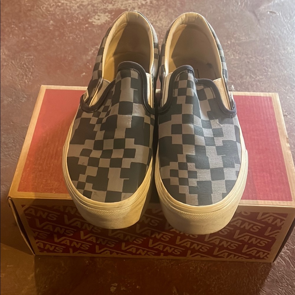 Vans Women’s Platform Checkerboard Slip-On Sneakers